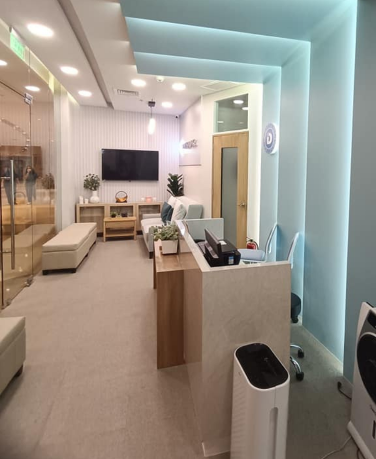 Sleek and inviting dental clinic interior at Shangri-La Plaza Mall with ambient lighting, minimalist design, and a calming atmosphere.